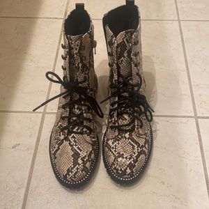 Express snakeskin combat boots